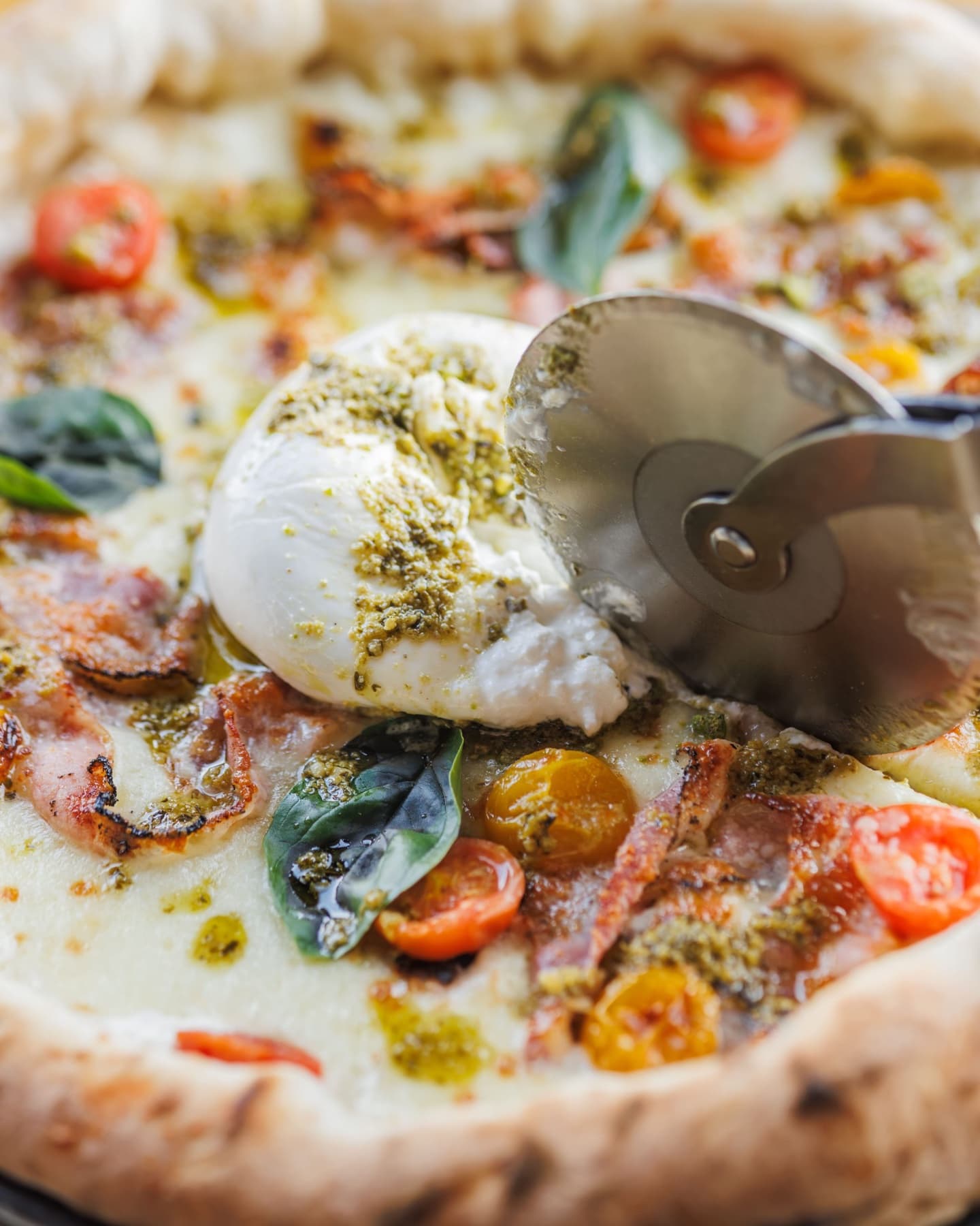 Pizza with burrata and fresh basil